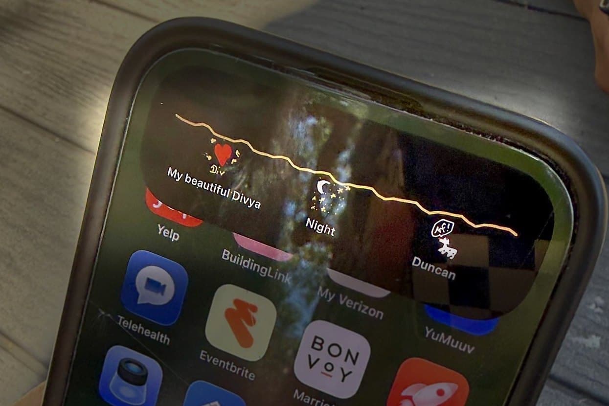 The other phone: a red heart captioned My beautiful Divya, a moon called Night, and a dog called Duncan