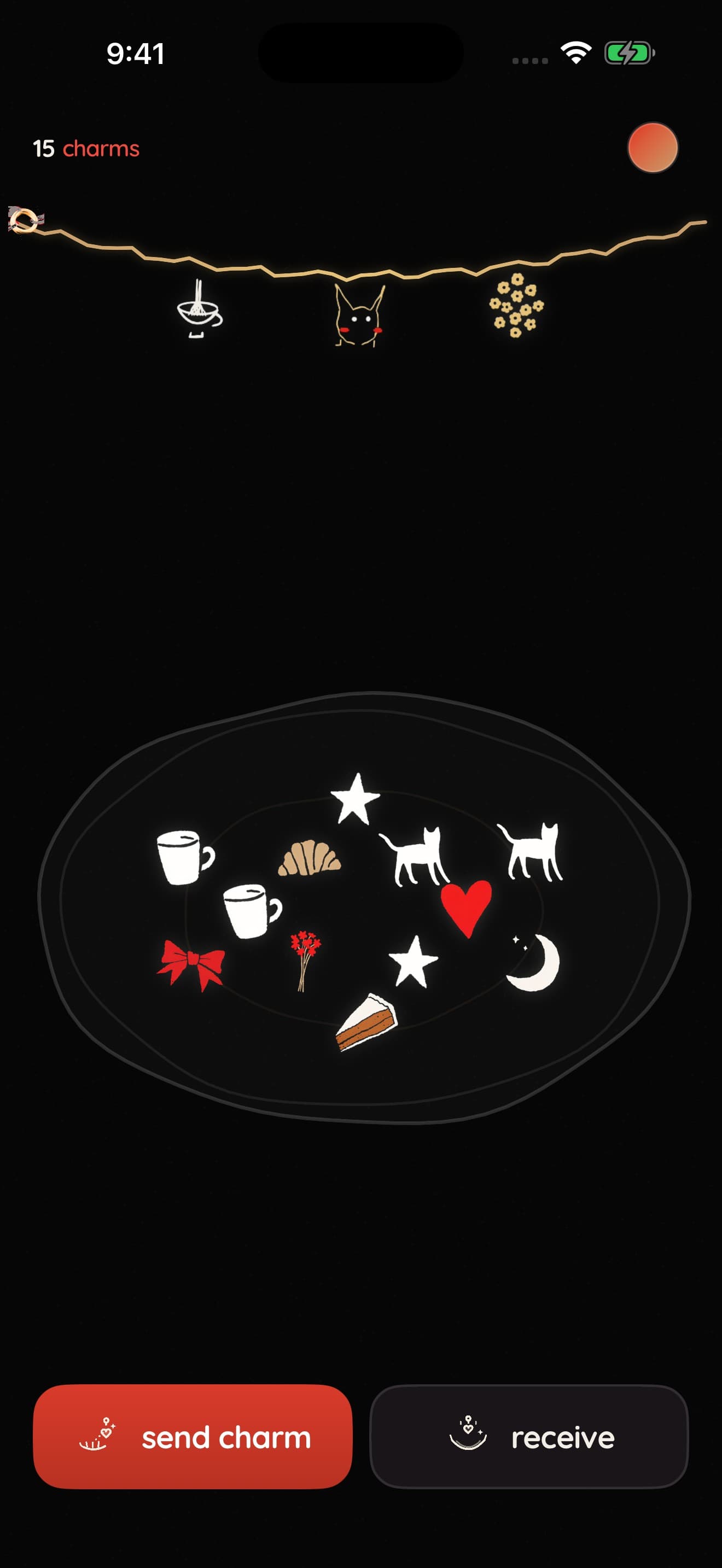 The app's home screen: a jewelry tray holding charms under the bracelet